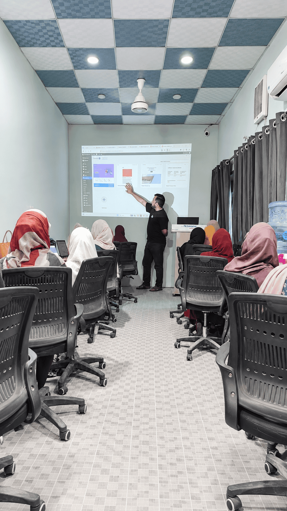 FMETP trainees working together on a project during a practical session